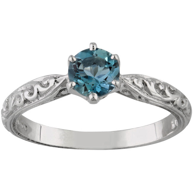 Unique aquamarine engagement ring in platinum