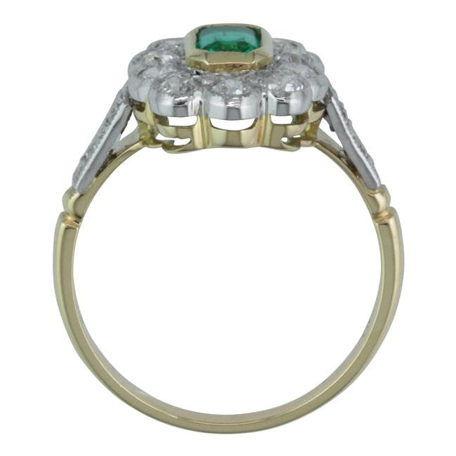 Side view vintage cluster ring with emerald and diamonds