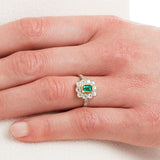 Vintage emerald cluster ring on hand