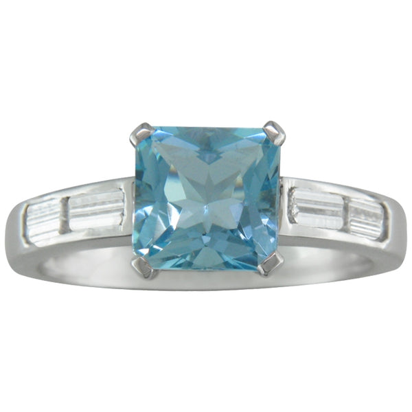 Aquamarine engagement ring with emerald cut diamond band