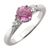 Pink sapphire and diamond three stone ring