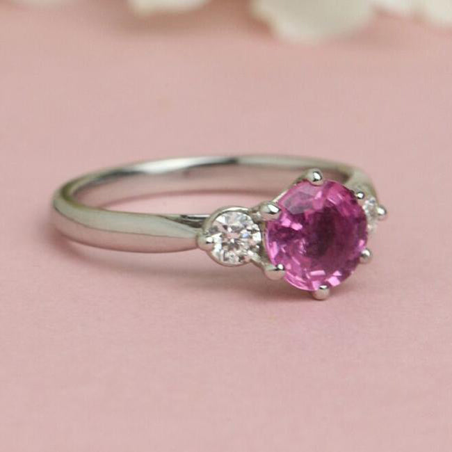 Pink sapphire ring on paper