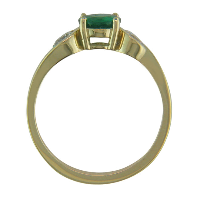 Emerald ring diamond side stones