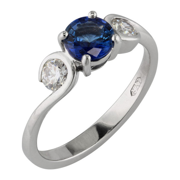 Unusual sapphire and diamond trilogy ring
