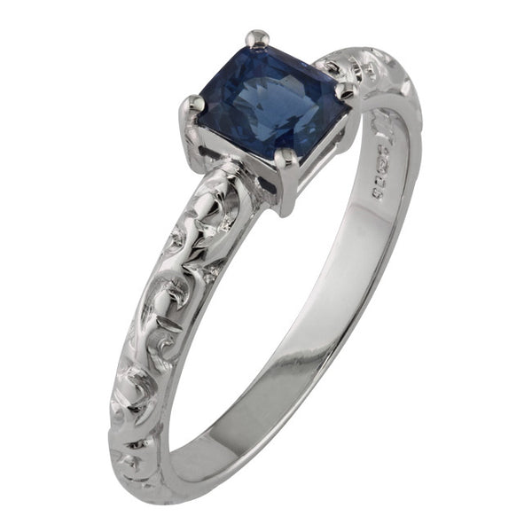 Engraved blue sapphire engagement ring