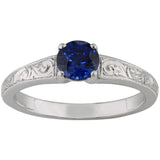 Unusual blue sapphire ring engraved