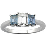 Emerald cut diamond three stone ring with aquamarine side stones