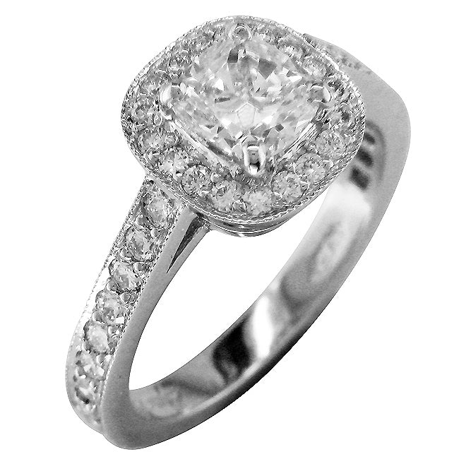 Cushion cut diamond cluster ring in platinum