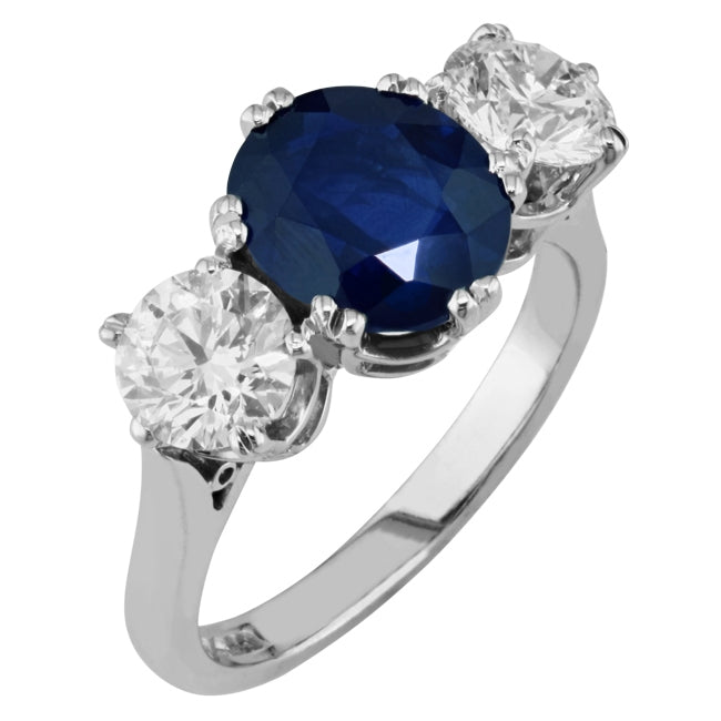 Custom made 3-stone sapphire and diamond ring