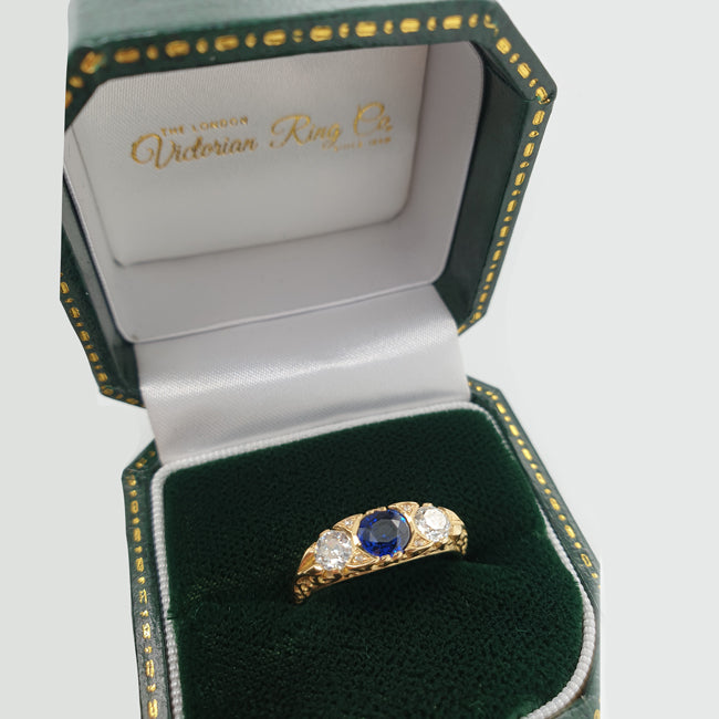 Sapphire and diamond engagement ring in yellow gold UK