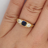 Victorian style sapphire diamond ring on hand