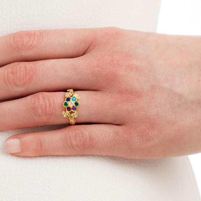 Yellow gold dearest ring on hand