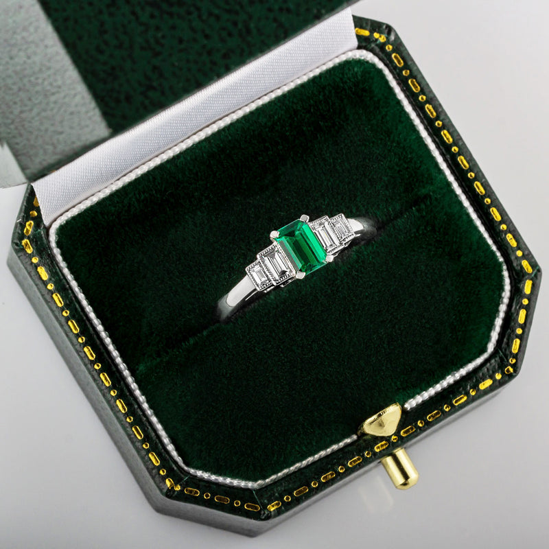 Emerald and baguette diamond five stone ring
