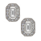 Emerald cut diamond cluster earrings in platinum