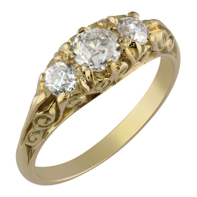 Antique style three stone ring yellow gold