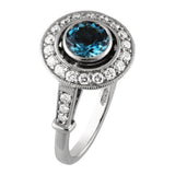 Aquamarine diamond halo engagement ring platinum