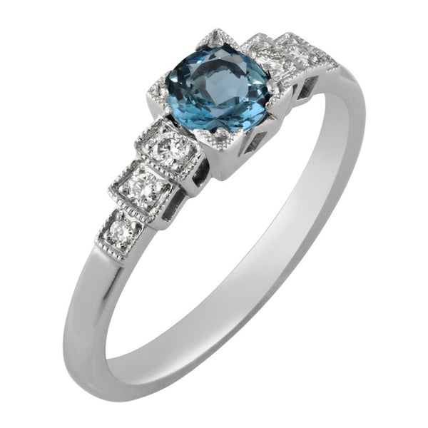 Aquamarine engagement ring with diamond band