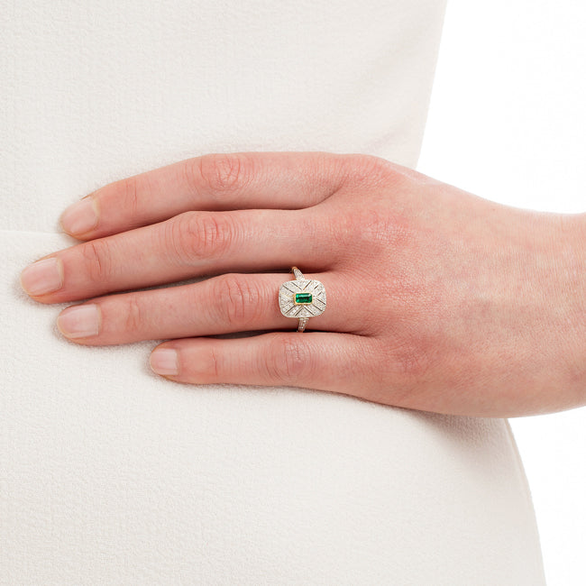 Art Deco emerald ring on hand