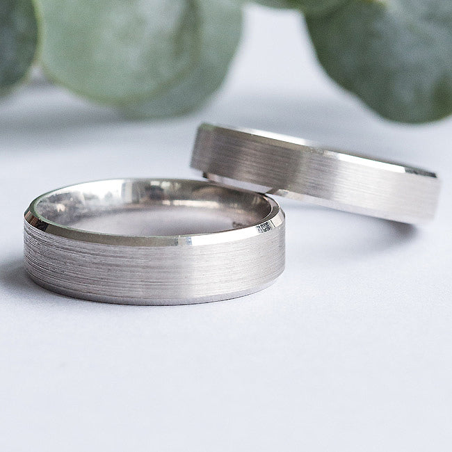 Brushed mens wedding rings with bevelled edge in platinum