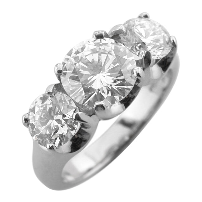 Commissioned three stone diamond ring