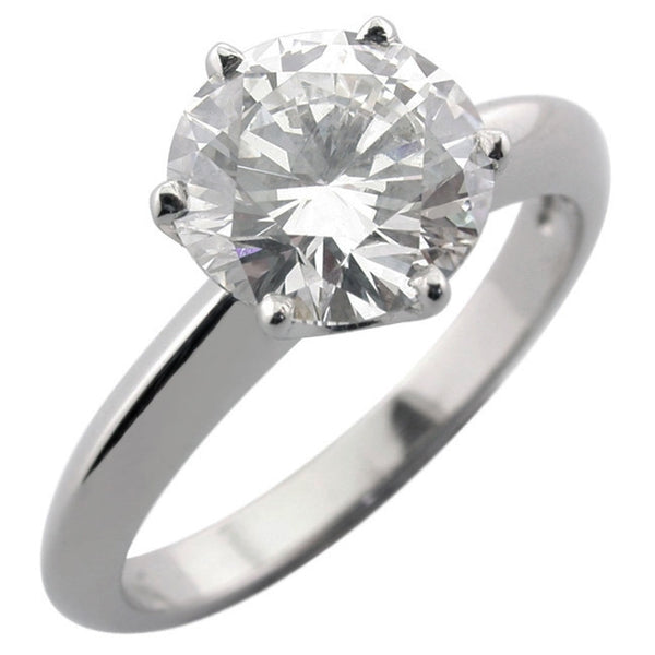 Customised knife edge solitaire diamond engagement ring