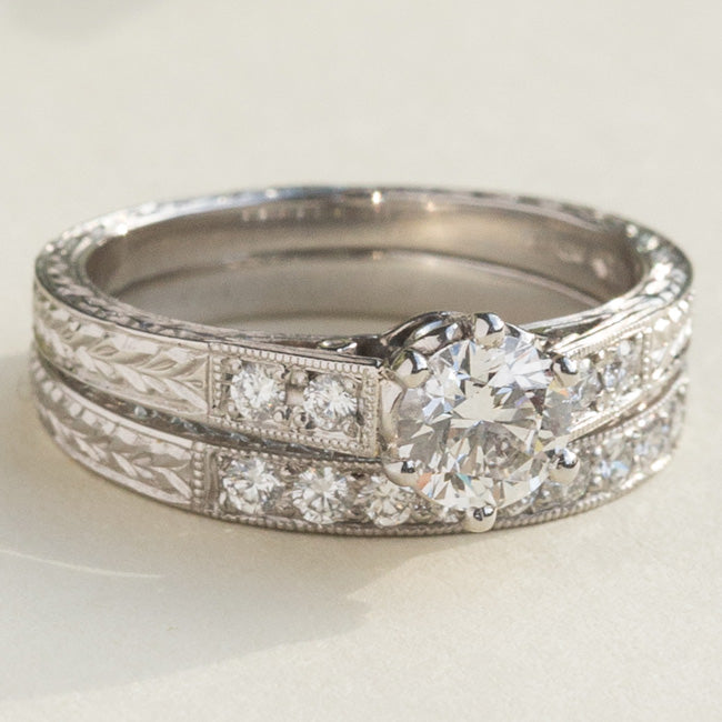 Diamond engraved engagement ring with diamond wedding ring