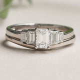 Emerald cut diamond ring with complimentary wedding ring in platinum