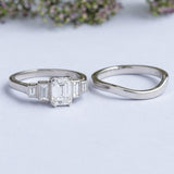 Emerald cut engagement ring with matching wedding ring