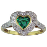 Heart shaped emerald halo engagement ring