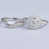 Matching set with shaped diamond wedding ring and cluster engagement ring in platinum