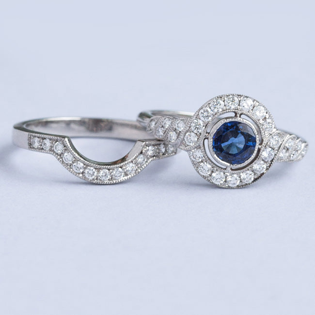 Halo engagement ring with matching diamond wedding ring