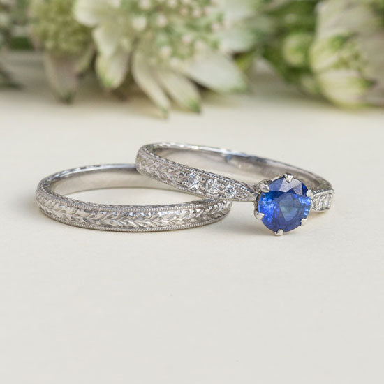 Vintage bridal set with laurel engraved sapphire engagement ring