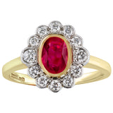 Oval ruby cluster ring in yellow gold