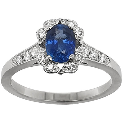 Oval sapphire and diamond cluster ring