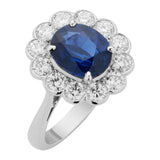 Oval sapphire halo cluster ring in platinum