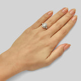 Oval shape diamond ring with fleur de lys motif