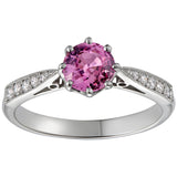 Pink sapphire engagement ring with diamond band