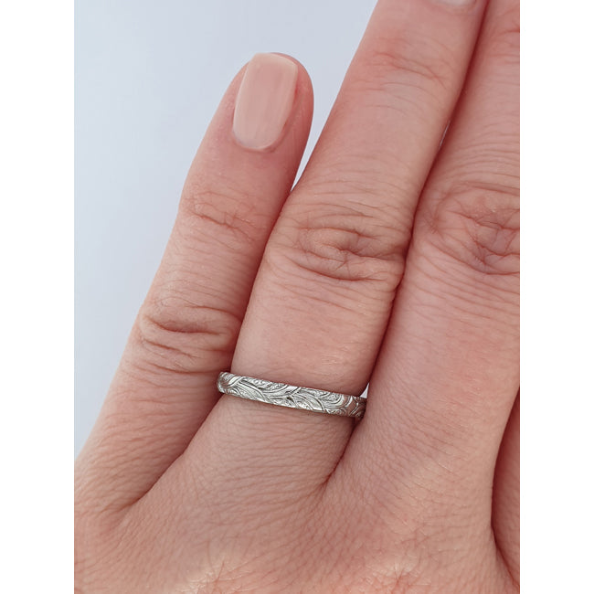 Platinum engraved wedding ring botanical design