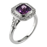 Purple sapphire halo ring in platinum