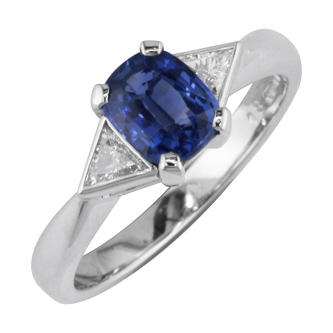 Three stone sapphire engagement ring with triangle diamonds