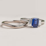 Sapphire three stone ring with complimentary wedding ring