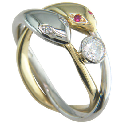 Contemporary double snake ring with ruby eyes