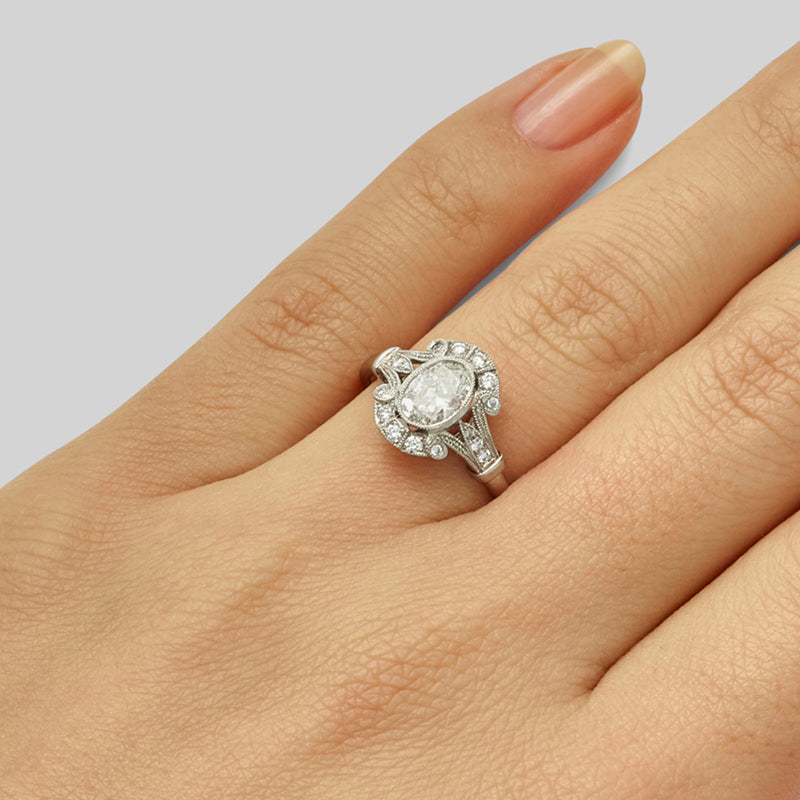Unusual oval diamond engagement ring