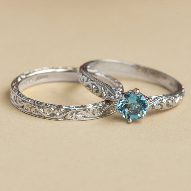 Platinum bridal set with aquamarine ring