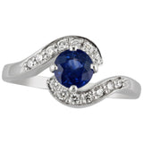 White gold sapphire ring with diamond band