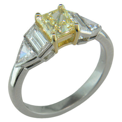 Fancy intense yellow diamond engagement ring with trillions and baguettes