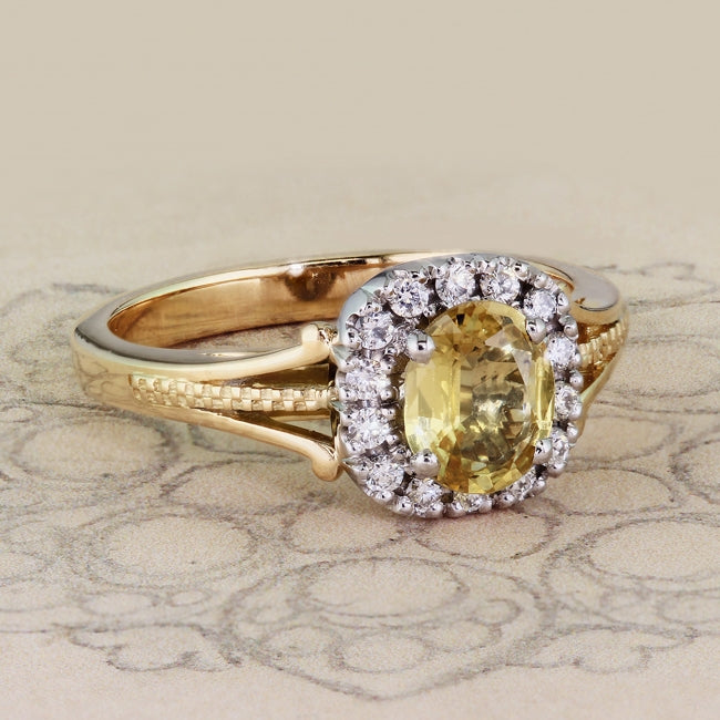 Yellow sapphire cluster ring on paper