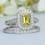 Yellow sapphire ring with platinum wedding band